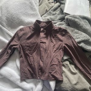 Tna zip up cropped action